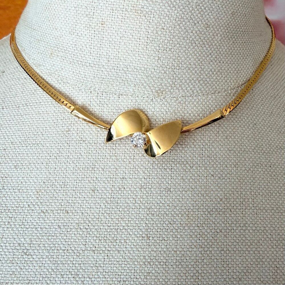 Gold Tone Bow Necklace with Clear Solitaire Crystal
